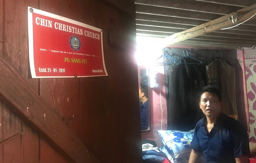 Posters and calendars convey a strong sense of affiliation to the Chin Christian Church in Sang Lian's home. Firstpost/Pallavi R
