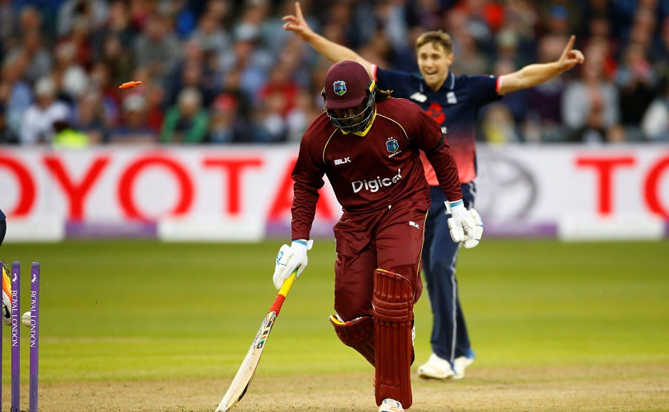 Here, West Indies' Chris Gayle is run out by England's Adil Rashid, from which the team couldn't recover. Reuters Here, West Indies' Chris Gayle is run out by England's Adil Rashid, from which the team couldn't recover. Reuters