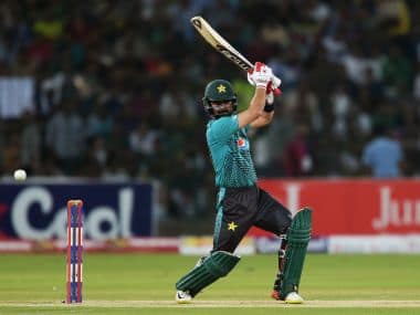 Pakistani batsman Ahmed Shehzad plays a shot during the third T20I match against the World XI. AFP