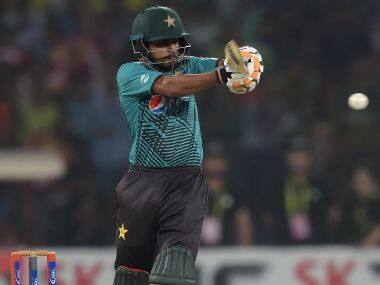 Pakistani batsman Babar Azam plays a shot during the first Twenty20 international match between the World XI and Pakistan at the Gaddafi Cricket Stadium in Lahore on September 12, 2017. / AFP PHOTO / AAMIR QURESHI