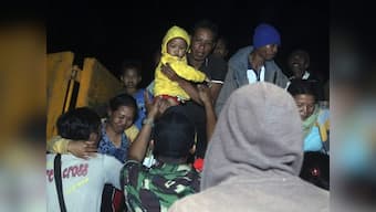 Thousands in Indonesia flee Bali island as authorities raise volcano alert status to highest level