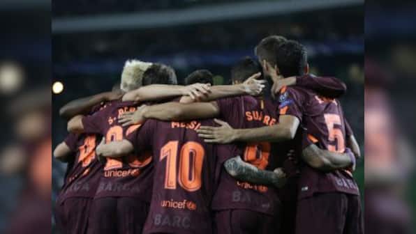 Champions League: Barcelona labour to victory at Sporting Lisbon to stay top of group