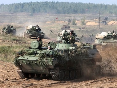 Belarusian army vehicles preparing for war games. AP