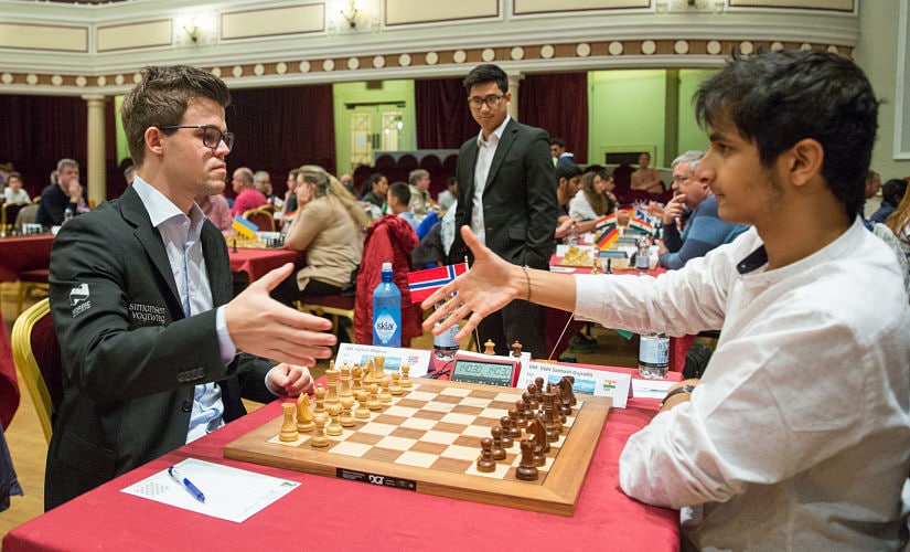 Title favourite Magnus Carlsen kicks off Qatar Masters Open with an easy  win