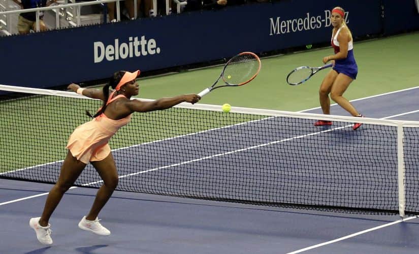 Sloane Stephens, left, of the United States, is unable to hit a shot from Dominika Cibulkova, of Slovakia, during the U.S. Open tennis tournament, Wednesday, Aug. 30, 2017, in New York. (AP Photo/Julio Cortez)