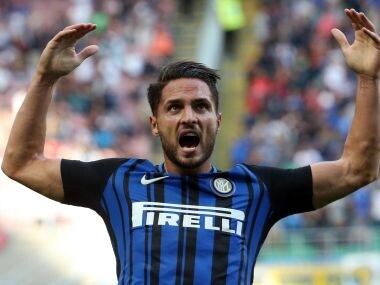 Inter Milan's Danilo D'Ambrosio, right, celebrates after scoring during a Serie A soccer match between Inter Milan and Genoa, at Milan's San siro Stadium, northern Italy, Sunday, Sept. 24, 2017. (Matteo Bazzi/ANSA via AP)
