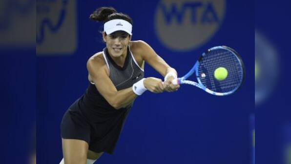 Wuhan Open: Garbine Muguruza survives Magda Linette scare, sets up quarter-final against Jelena Ostapenko