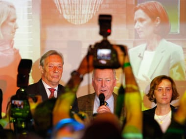 Alexander Gauland (centre), co-top candidate of the nationalist German AfD addresses reporters on Sunday. AP