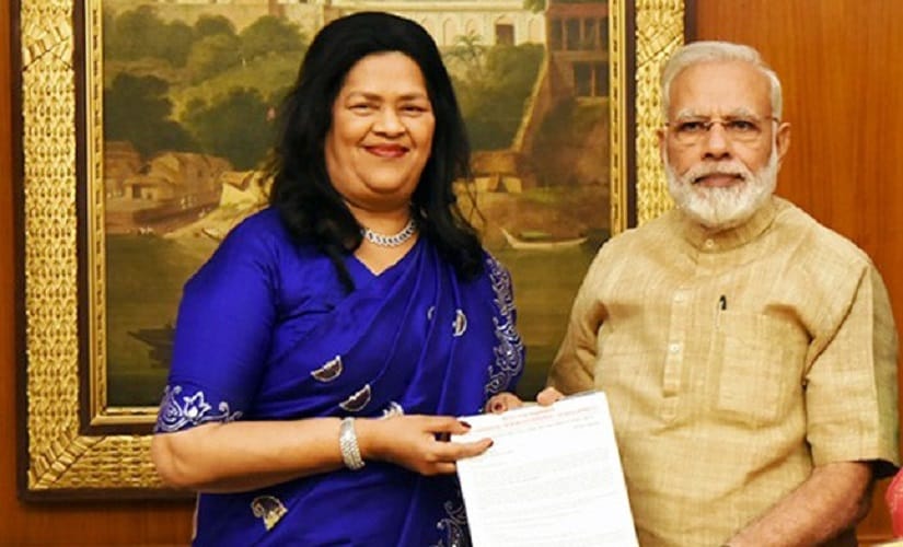 File image of Grace Pinto with Prime Minister Narendra Modi. Image courtesy: Ryaninternational.org