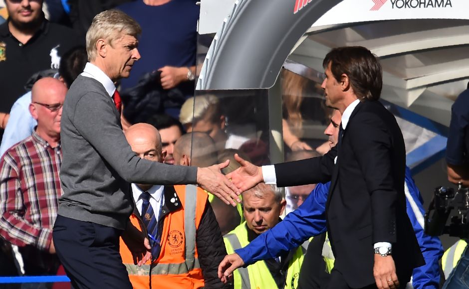 Arsenal manager Arsene Wenger (L) and Chelsea boss Antonio Conte had to settle for a point each after a 0-0 draw at Stamford Bridge. AFP Arsenal manager Arsene Wenger (L) and Chelsea boss Antonio Conte had to settle for a point each after a 0-0 draw at Stamford Bridge. AFP