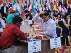 World Chess Champion Magnus Carlsen begins match with black against Anish  Giri in UN-backed campaign targeting racial discrimination-Sports News ,  Firstpost