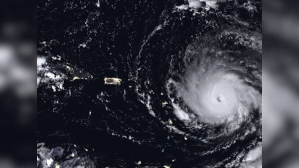 As Irma weakens into inland rainstorms, evacuees return home to water-logged Florida