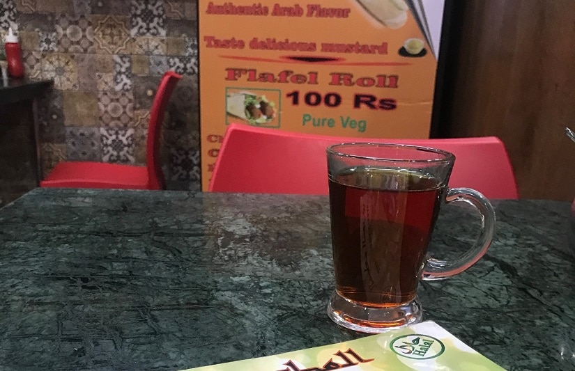 Middle Eastern restaurants in Delhi often employ Syrian refugees as translators. Firstpost/ Pallavi R