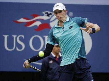 Kevin Anderson, of South Africa, returns a shot from Pablo Carreno Busta, of Spain, during the semifinals of the U.S. Open tennis tournament, Friday, Sept. 8, 2017, in New York. (AP Photo/Julio Cortez)