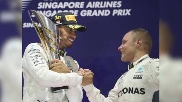 Singapore Grand Prix: Lewis Hamilton produces champion's race as first-lap carnage sinks Sebastian Vettel