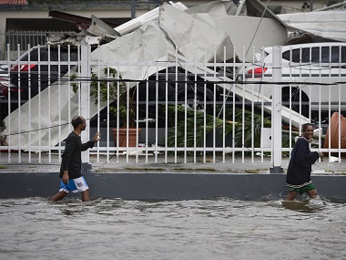 Puerto Rico battles floods after Hurricane Maria ravages island; death toll climbs to 33 Puerto Rico battles floods after Hurricane Maria ravages island; death toll climbs to 33