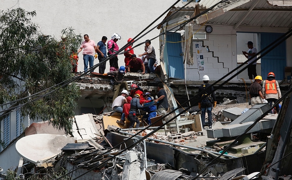 President Enrique Pena Nieto, who rushed to the site, warned the death toll could rise. President Enrique Pena Nieto, who rushed to the site, warned the death toll could rise.