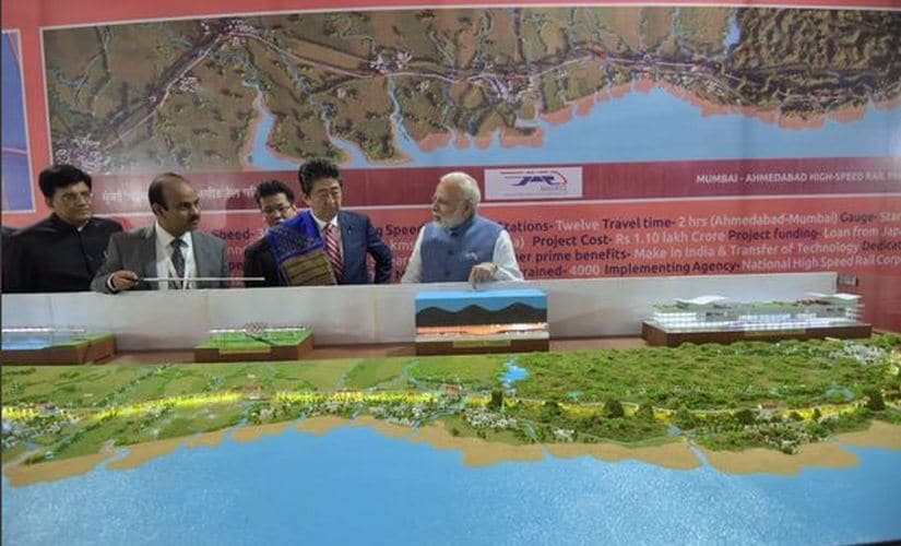 Narendra Modi and Shinzo Abe reviewing map of bullet train's route. Twitter/ @DDNewsLive