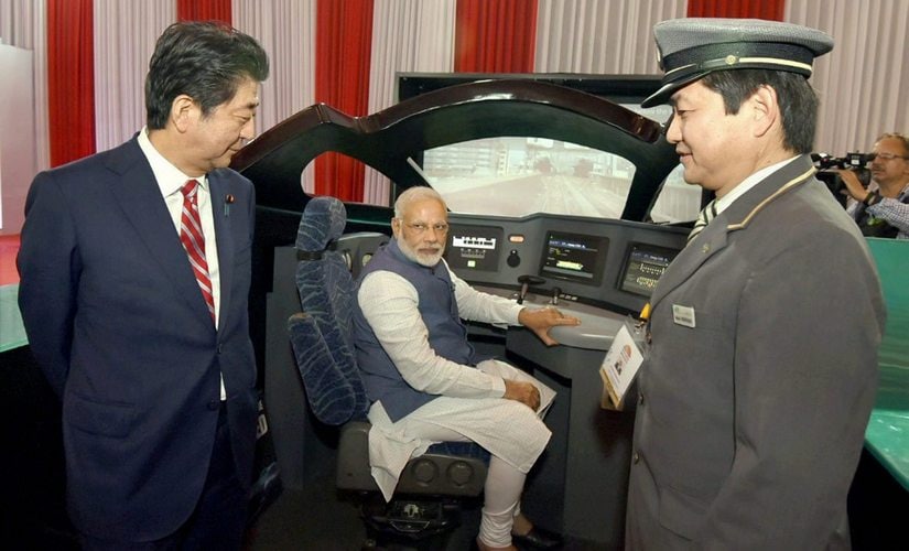 Prime Minister Narendra Modi with his Japanese counterpart, Shinzo Abe during their visit to an exhibition at Mahatma Mandir, in Gandhinagar on Thursday. PTI