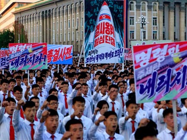 thousands of North Koreans gathered at Kim Il Sung Square to attend a mass rally against America on Saturday. AP