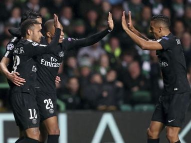 PSG's Neymar, front left, and his teammates celebrate the opening goal during their Champions League match. AP