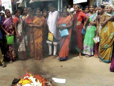 Telangana women burn 'poor-quality' sarees gifted by KCR govt for Bathukamma festival Telangana women burn 'poor-quality' sarees gifted by KCR govt for Bathukamma festival