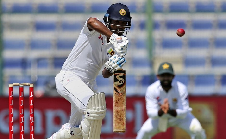 Opener Dimuth Karunaratne was run out on 93 at Sheikh Zayed Stadium, the only wicket to fall in the final session. He was seven runs from a seventh Test century, and third this year. AP Opener Dimuth Karunaratne was run out on 93 at Sheikh Zayed Stadium, the only wicket to fall in the final session. He was seven runs from a seventh Test century, and third this year. AP