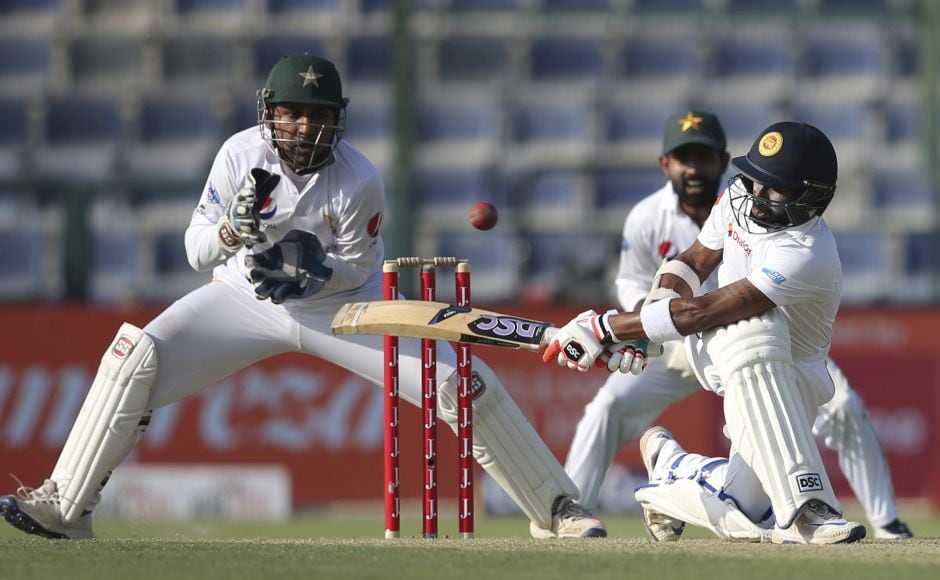 Dinesh Chandimal (60) and Niroshan Dickwella (42) were not out at stumps, playing out nearly 21 overs together. AP Dinesh Chandimal (60) and Niroshan Dickwella (42) were not out at stumps, playing out nearly 21 overs together. AP