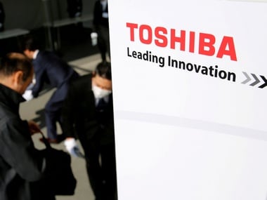 The logo of Toshiba is seen as shareholders arrive. Reuters