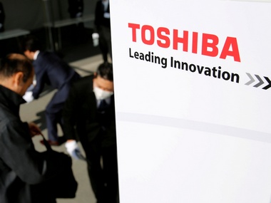 Toshiba signs $18 billion deal to sell its chip unit to a consortium lead by Bain Capital Toshiba signs $18 billion deal to sell its chip unit to a consortium lead by Bain Capital