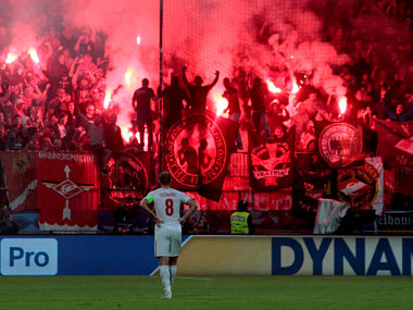 Champions League: Spartak Moscow charged by UEFA after flare thrown by fans almost hits referee Champions League: Spartak Moscow charged by UEFA after flare thrown by fans almost hits referee