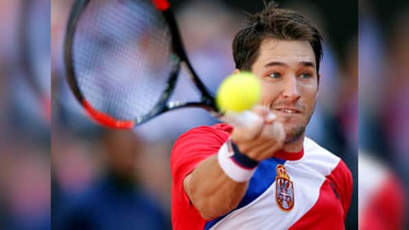 Davis Cup: Belgium go one-up against Australia; Serbia take shock lead against France