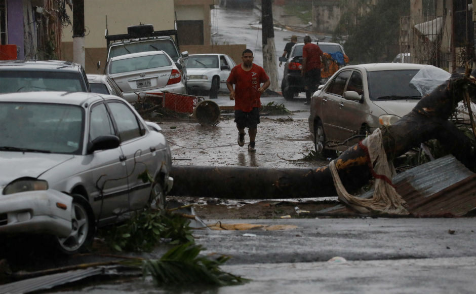Maria ripped roofs from buildings and turned low-lying roadways into rushing debris-laden rivers as it cut a diagonal swath across the island. It is now expected to move near the coasts of the Dominican Republic and the Turks and Caicos islands and then drifting more eastwards. Reuters Maria ripped roofs from buildings and turned low-lying roadways into rushing debris-laden rivers as it cut a diagonal swath across the island. It is now expected to move near the coasts of the Dominican Republic and the Turks and Caicos islands and then drifting more eastwards. Reuters
