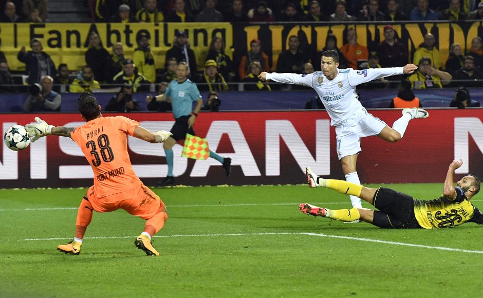 Cristiano Ronaldo scored a brace after Gareth Bale gave Real Madrid the lead against Borussia Dortmund The defending champions won 3-1 on the night. AP Cristiano Ronaldo scored a brace after Gareth Bale gave Real Madrid the lead against Borussia Dortmund The defending champions won 3-1 on the night. AP