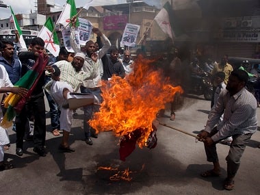 Muslim groups burn effigies protesting against the persecution of Myanmar's Rohingya. AP