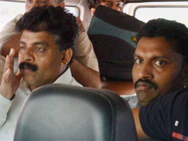 Gurugram: Regional Head of Ryan Group of Institutions Francis Thomas (in white shirt) and HR head Jeyus Thomas (grey shirt) being taken to court in Sohna near Gurugram on Monday. PTI