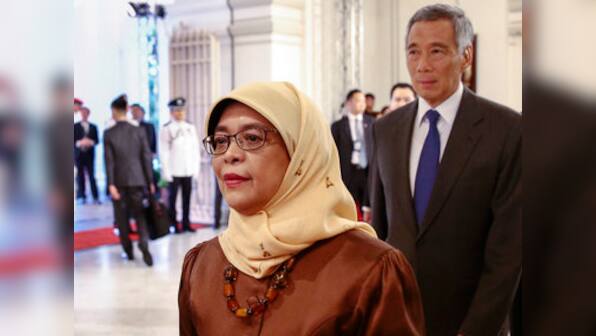 Singapore's first female president Halimah Yacob sworn in amid criticism for taking office without a vote