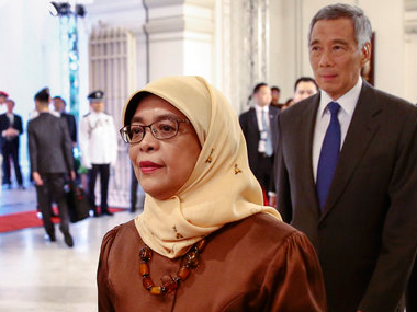 Singapore's first female president Halimah Yacob sworn in amid criticism for taking office without a vote Singapore's first female president Halimah Yacob sworn in amid criticism for taking office without a vote