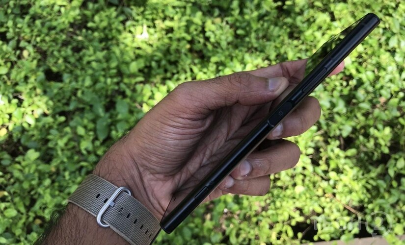 The power button doubles as a fingerprint sensor