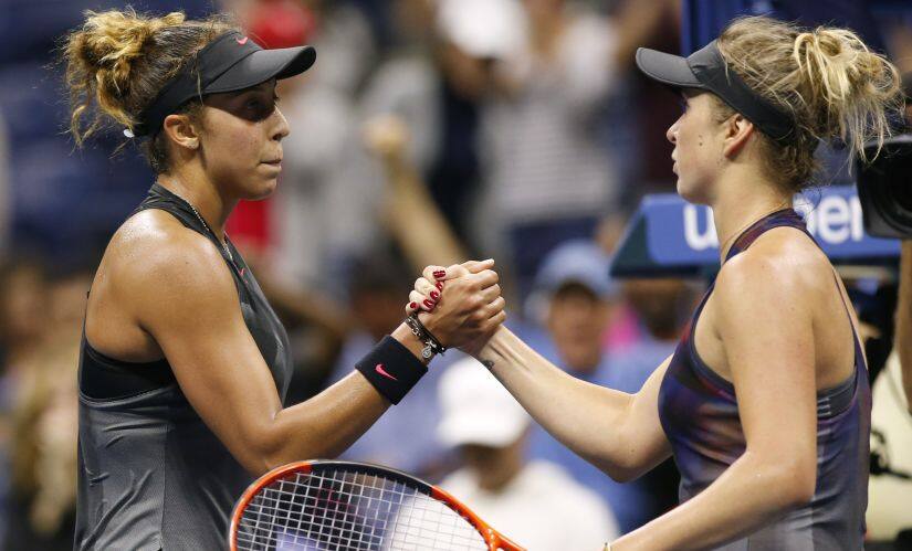 Madison Keys, of the United States, left, shakes hands with Elina Svitolina, of Ukraine, after upsetting her at the U.S. Open tennis tournament in New York, Monday, Sept. 4, 2017. (AP Photo/Kathy Willens)
