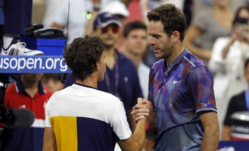 Juan Martin del Potro, of Argentina, shakes hands with Dominic Thiem, of Austria, after winning their match during the fourth round of the U.S. Open tennis tournament, Monday, Sept. 4, 2017, in New York. (AP Photo/Adam Hunger)