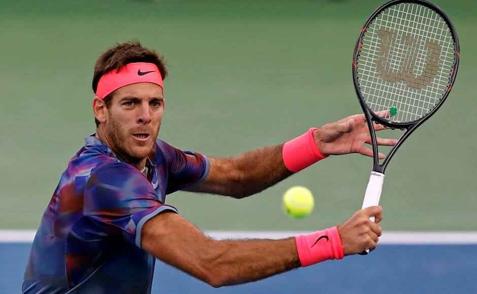 Juan Martin del Potro, of Argentina, hits a return shot to Dominic Thiem, of Austria, during the fourth round of the U.S. Open tennis tournament, Monday, Sept. 4, 2017, in New York. (AP Photo/Adam Hunger)