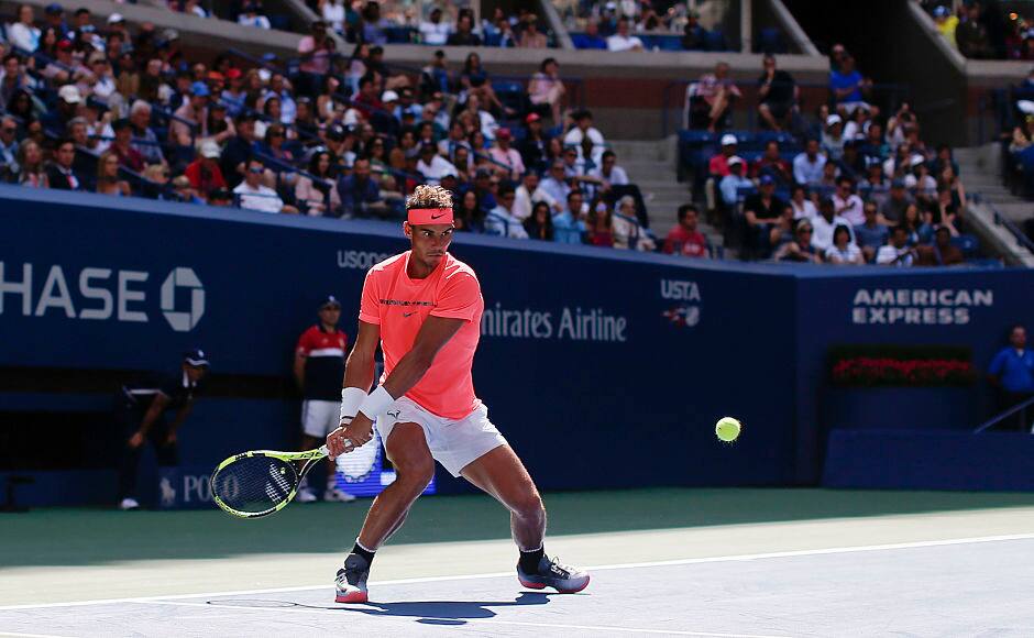 Rafael Nadal, of Spain, returns a shot from Alexandr Dolgopolov, of Ukraine, during the fourth round of the U.S. Open tennis tournament, Monday, Sept. 4, 2017, in New York. (AP Photo/Julie Jacobson)