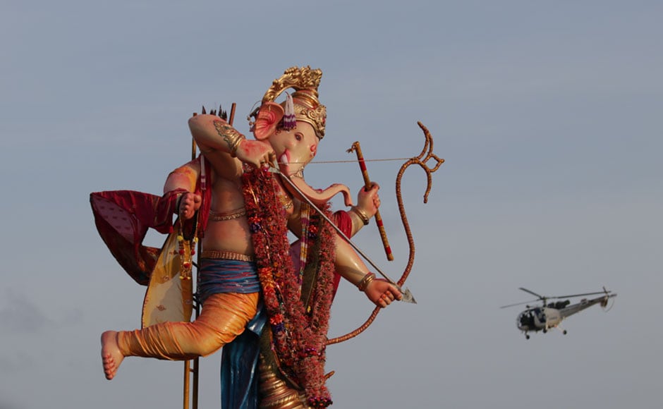 This year, the Maharashtra Tourism Development Corporation had made special arrangements for domestic and international tourists to view the immersion ceremonies at Girguam and other places as part of its new intiaitive — Ganeshotsav Tourism. Image courtesy Sachin Gokhale/Firstpost This year, the Maharashtra Tourism Development Corporation had made special arrangements for domestic and international tourists to view the immersion ceremonies at Girguam and other places as part of its new intiaitive — Ganeshotsav Tourism. Image courtesy Sachin Gokhale/Firstpost