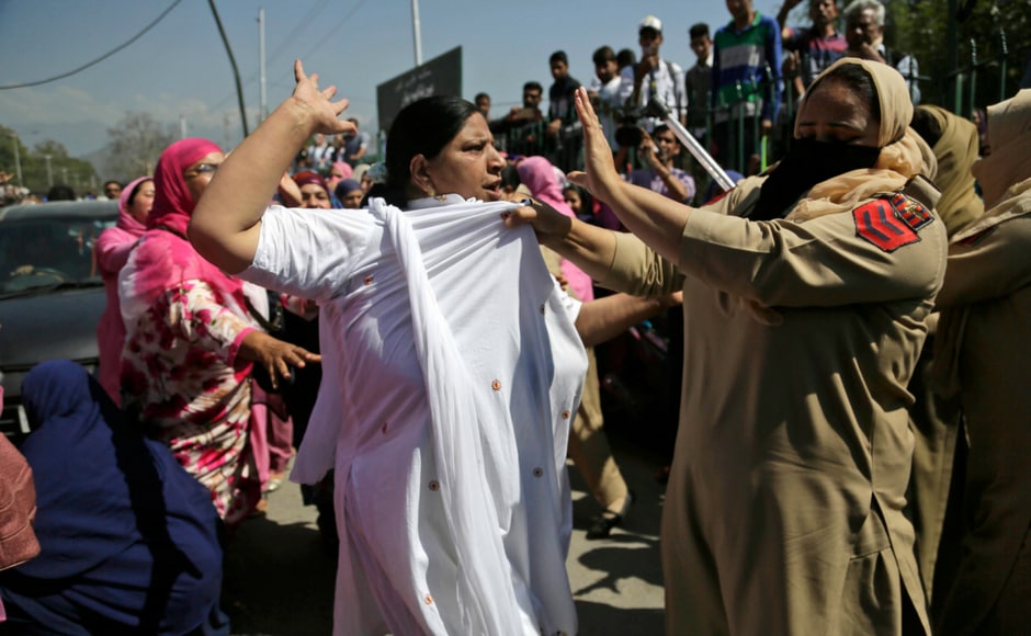 Another Anganwadi gets into a scuffle with a policewoman in Srinagar. PTI Another Anganwadi gets into a scuffle with a policewoman in Srinagar. PTI