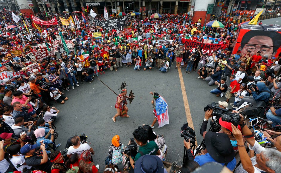 Hundreds of protesters gather for a rally near the Presidential Palace to call for an end to the killings in the so-called war on drugs of President Rodrigo Duterte and his alleged Hundreds of protesters gather for a rally near the Presidential Palace to call for an end to the killings in the so-called war on drugs of President Rodrigo Duterte and his alleged