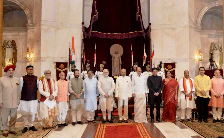 President Ram Nath Kovind, Vice President M. Venkaiah Naidu, Prime Minister Narendra Modi poses with some new members of cabinet after the reshuffle at Rashtrapati Bhavan in New Delhi on Sunday. PTI 