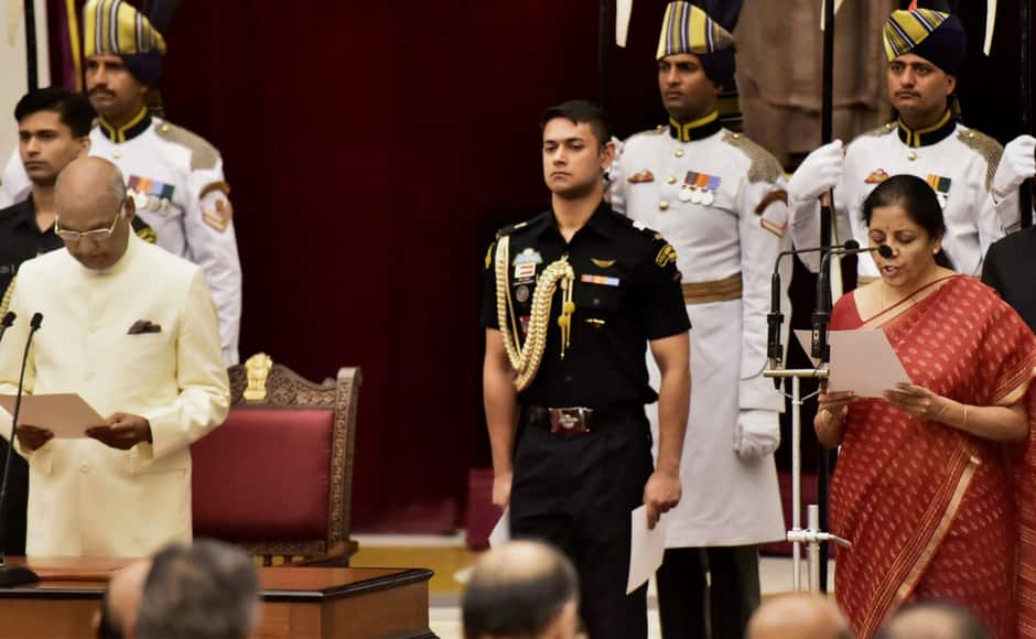Nirmala Sitharaman taes oath before President Ram Nath Kovind as the new defence minister. PTI