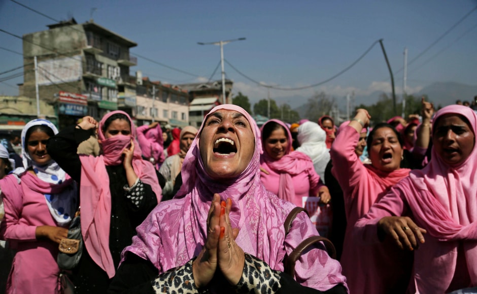 Kashmiri Anganwadi workers, government-sponsored children and mother care workers, shout slogans against the government during a protest in Srinagar on Monday. The protestors demanded permanent services and better wages. Kashmiri Anganwadi workers, government-sponsored children and mother care workers, shout slogans against the government during a protest in Srinagar on Monday. The protestors demanded permanent services and better wages.