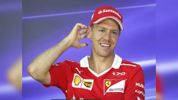Malaysian Grand Prix: Sebastian Vettel smiles through pain of another setback to championship challenge